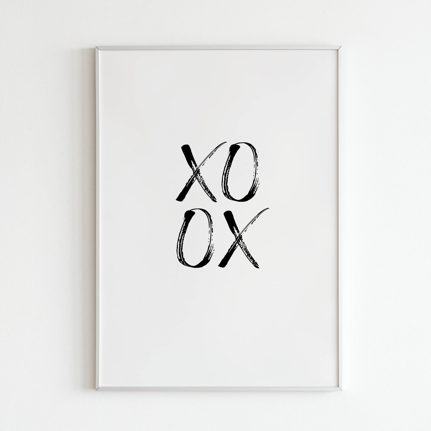 XOXO close-up of printable wall art poster. Explore the brushstrokes and details of the hearts and kisses.