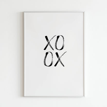 XOXO close-up of printable wall art poster. Explore the brushstrokes and details of the hearts and kisses.