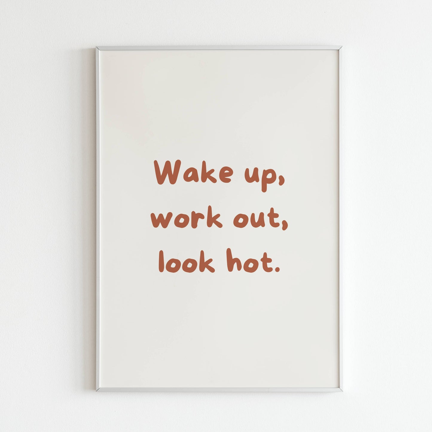 Downloadable "Wake up, work out, look hot" wall art for a fitness motivation boost.