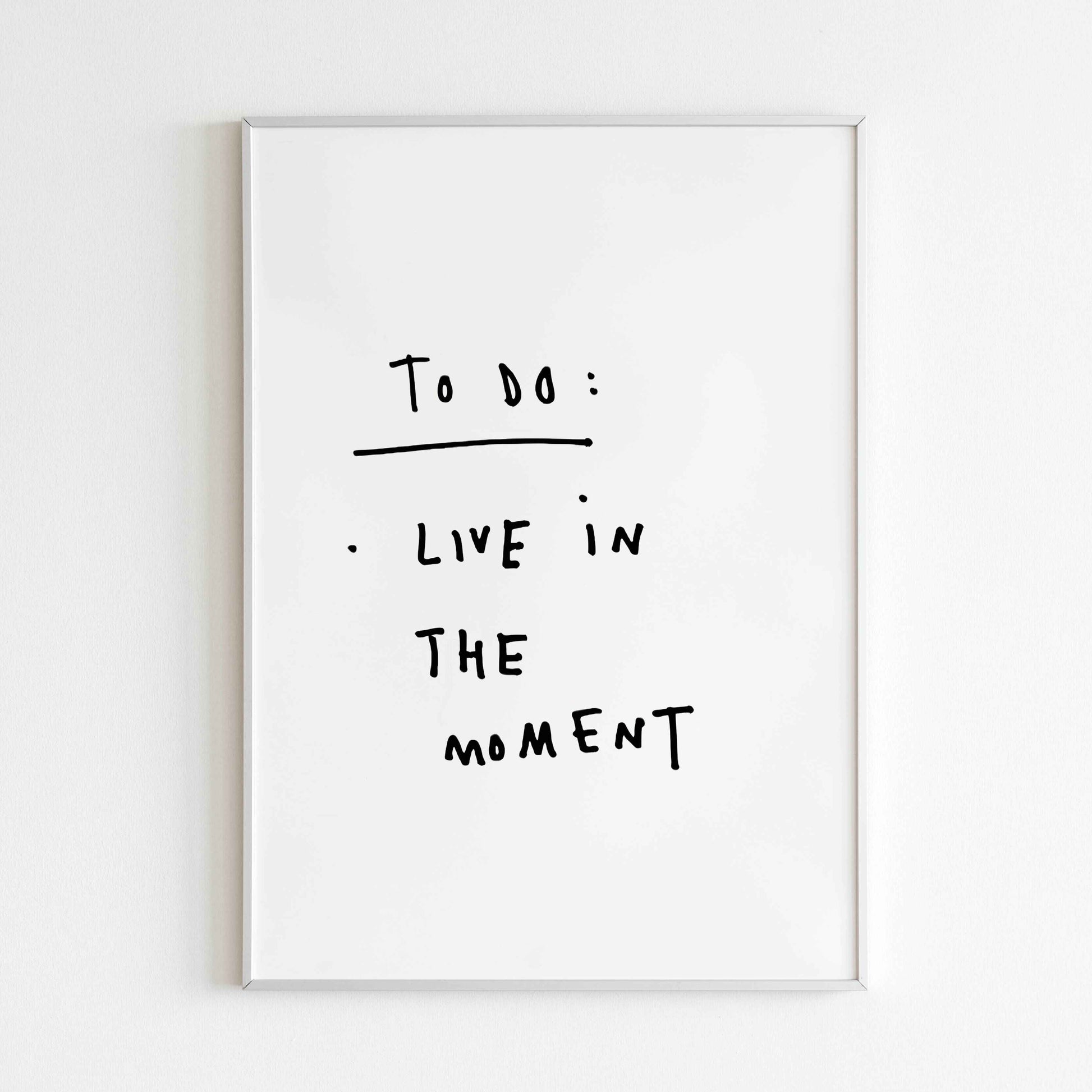 Motivational quote wall art encouraging living in the present.