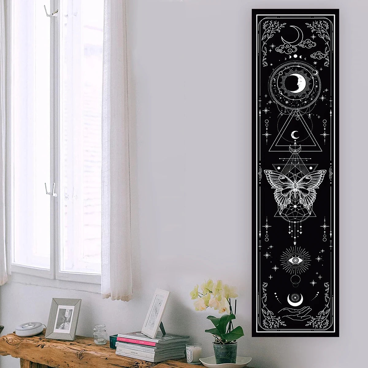 Celestial gothic tapestry featuring sun, moon, and butterfly in black and white

