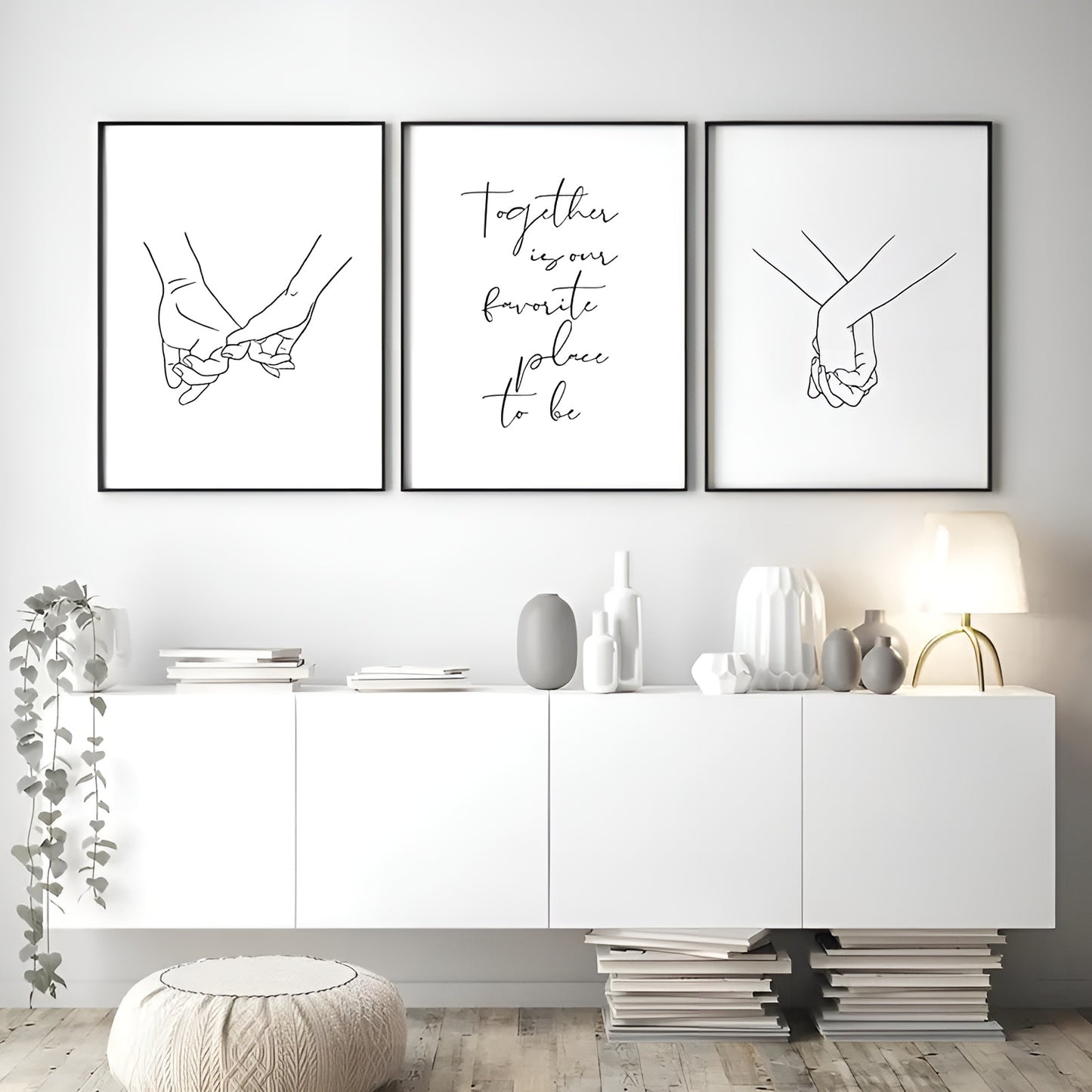 Set of 3 unframed black and white abstract holding hands canvas prints for stylish living room decoration.
