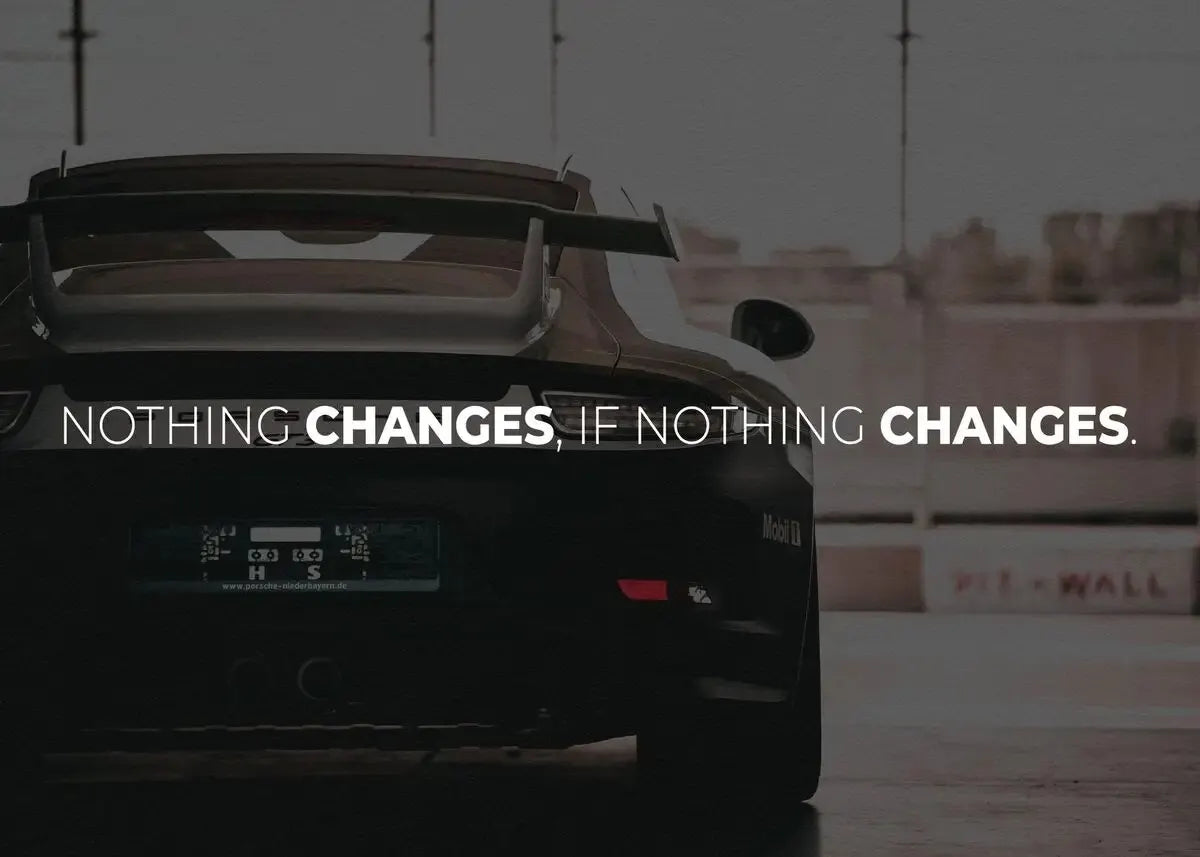 Motivational quote wall art with sleek supercar design

